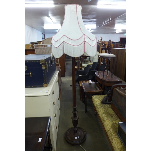 250 - A mahogany standard lamp