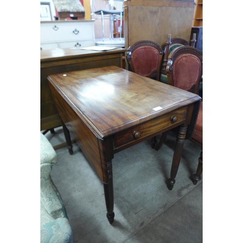 256 - A George IV mahogany Pembroke table