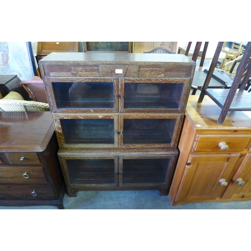 267 - A Minty oak three tier bookcase