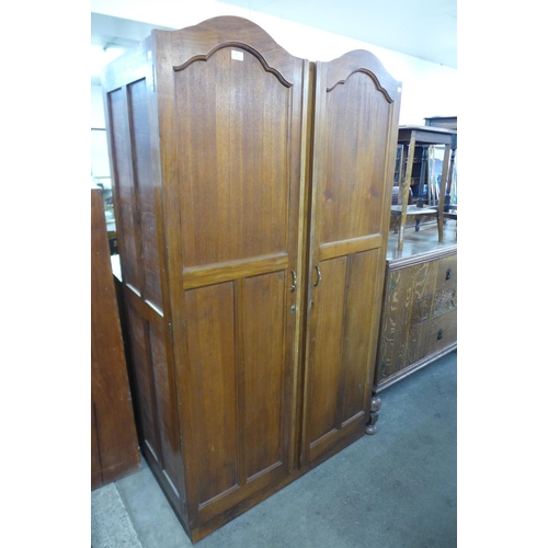 280 - A beech fitted wardrobe