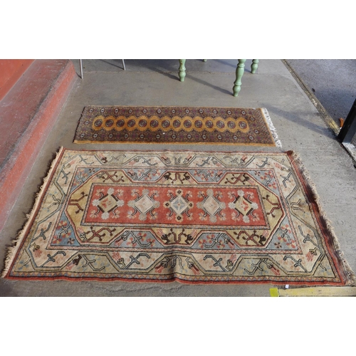 287 - An Afghan brown ground rug and one other