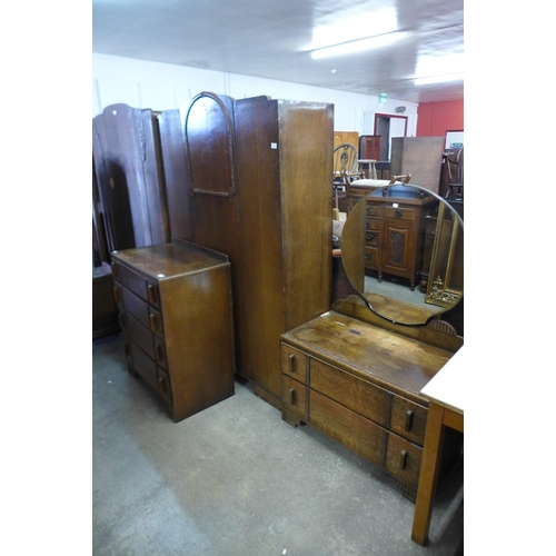 295 - An Art Deco oak three piece bedroom suite