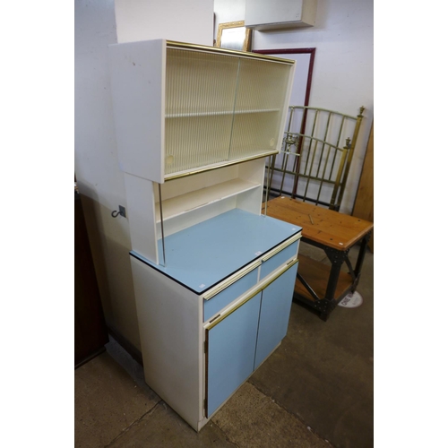 308 - A 1950's metamorphic kitchen cabinet