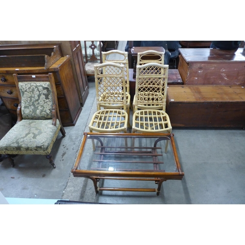 314 - A set of four bamboo chairs and a coffee table