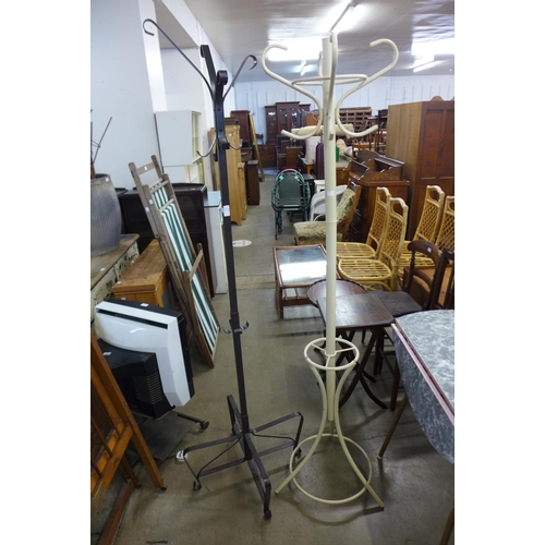 320 - Two metal coat stands