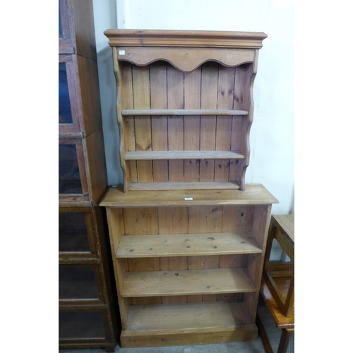 330 - A pine open bookcase and a Delft rack