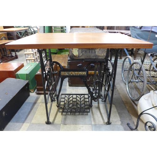 348 - A Frister & Rossman cast iron based table