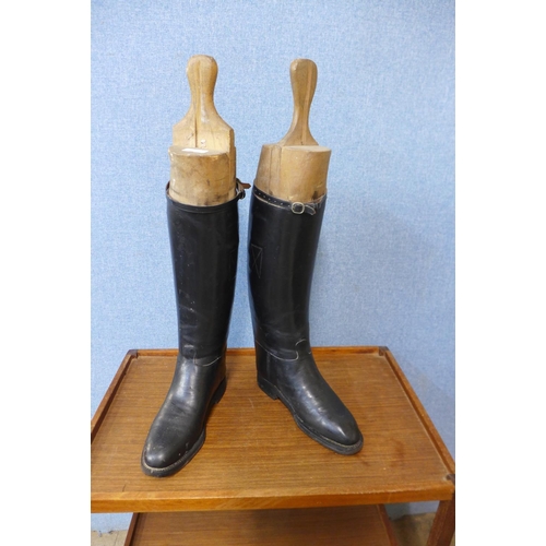 353 - A pair of riding boots, size 11, and wooden boot trees