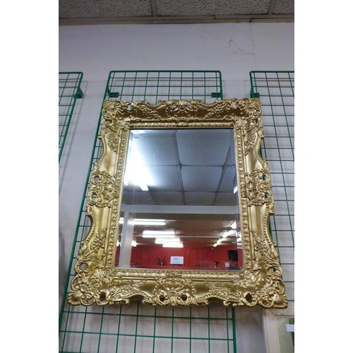 395 - A gilt framed mirror