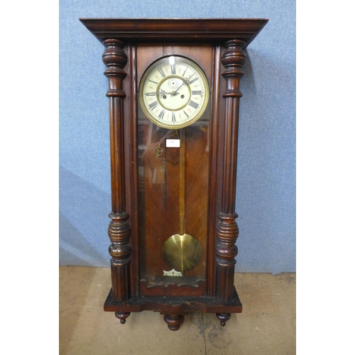 399 - A 19th Century mahogany Vienna wall clock