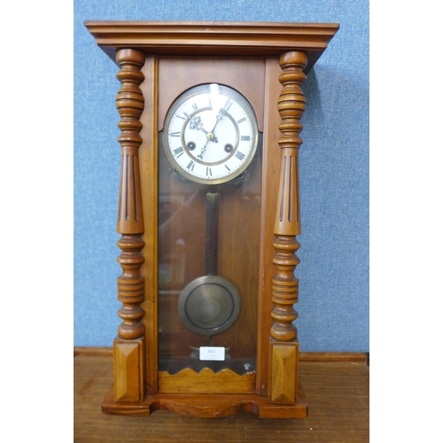 401 - A walnut Vienna wall clock