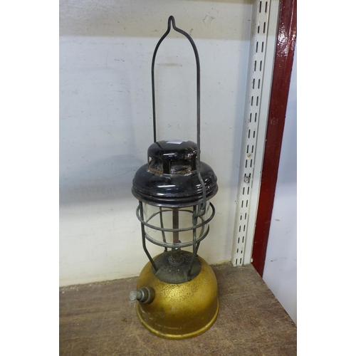 418 - A vintage gold pump Tilley lamp