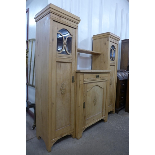 44 - A French pine breakfront side cabinet