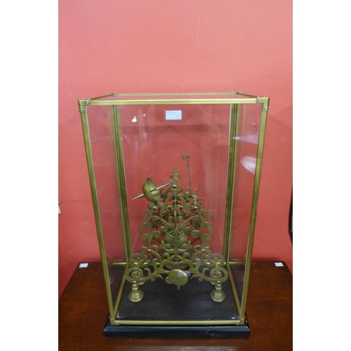 62 - A gilt metal fusee skeleton clock