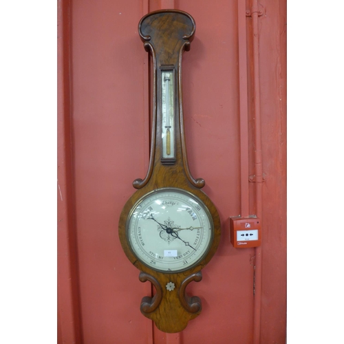 65 - A Victorian walnut banjo barometer