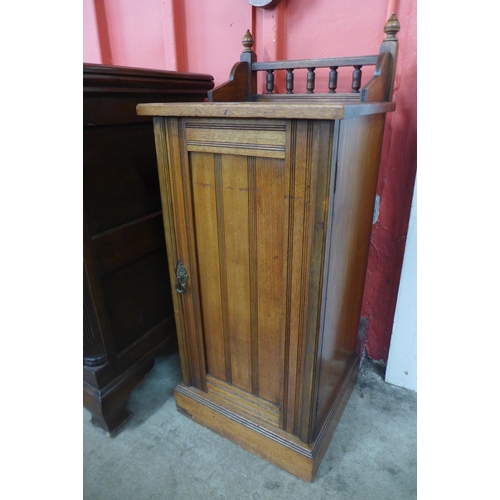 69 - A Victorian Aesthetic Movement walnut pot cupboard