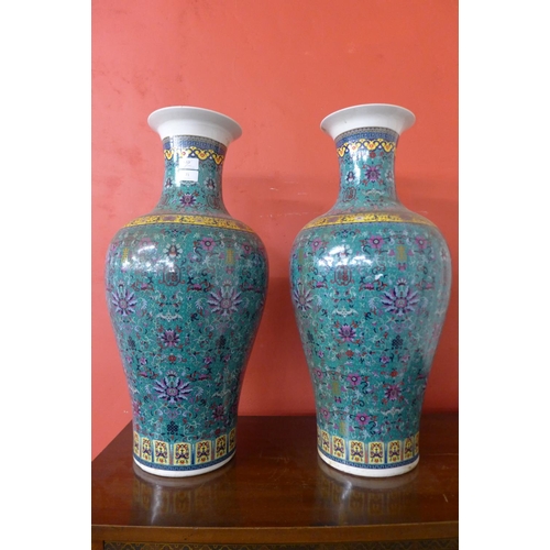 71 - A pair of similar Chinese poreclain famille vert vases