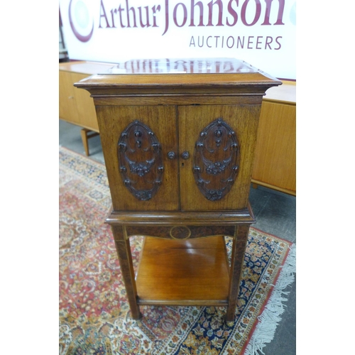 80 - A Victorian rosewood and amboyna music cabinet