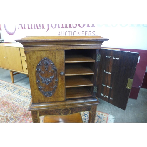 80 - A Victorian rosewood and amboyna music cabinet