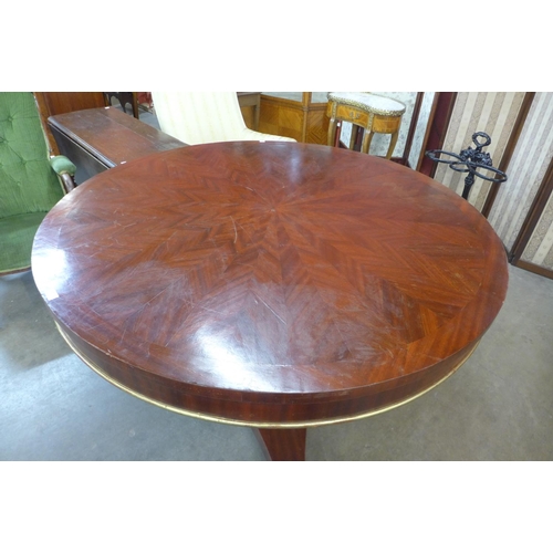 82 - A 19th Century mahogany and parcel gilt centre/dining table, 76cms h x 133cms d