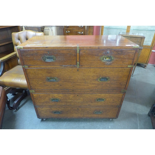 86 - A Victorian teak and brass mounted military campaign chest of drawers, with Bramah locks, 97cms h, 9... 