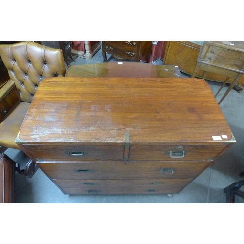 86 - A Victorian teak and brass mounted military campaign chest of drawers, with Bramah locks, 97cms h, 9... 