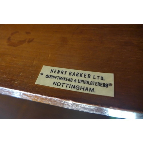 87 - An Edward VII mahogany serpentine single drawer side table, made by Henry Barker Ltd., Nottingham