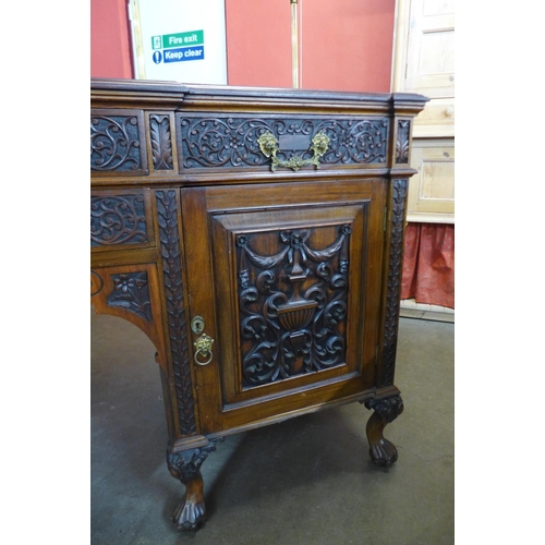 89 - A late 19th/early 20th Century Anglo-Indian carved rosewood breakfront sideboard