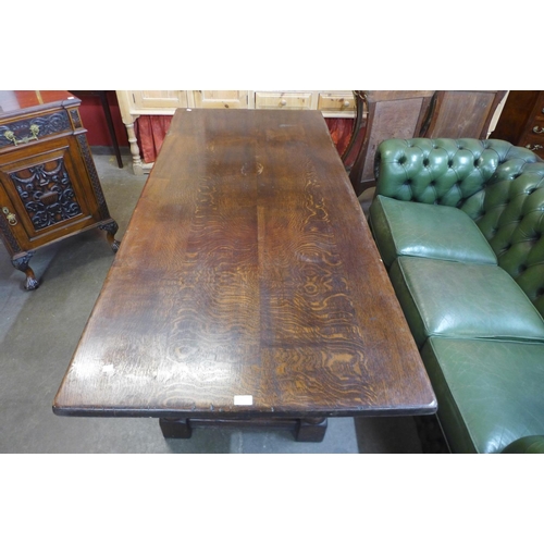 90 - An 18th Century style oak refectory table, 75cms h, 183cms l, 84cms w