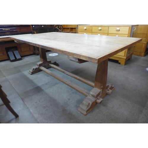 90a - A Gothic Revival hardwood refectory table and six chairs, manner of A.W.N. Pugin, table; 78cms h, 19... 