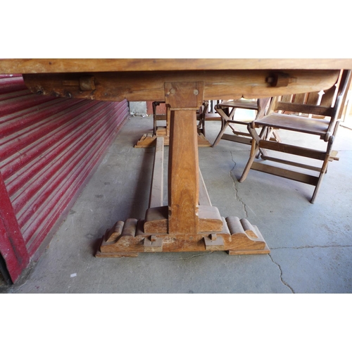 90a - A Gothic Revival hardwood refectory table and six chairs, manner of A.W.N. Pugin, table; 78cms h, 19... 