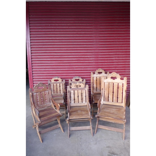 90a - A Gothic Revival hardwood refectory table and six chairs, manner of A.W.N. Pugin, table; 78cms h, 19... 