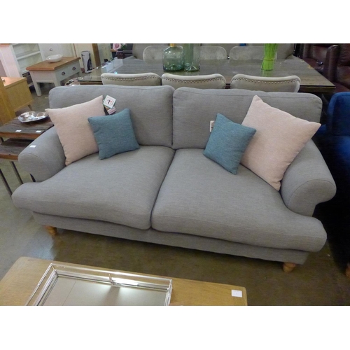 1301 - A grey upholstered two seater sofa