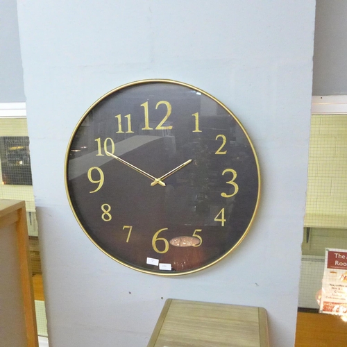 1396 - A black and gilt circular wall clock (2017824)   #