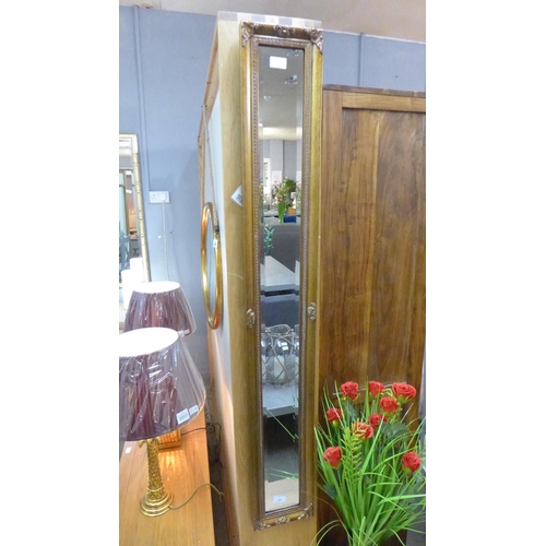 1489 - A slim gilt wall mirror (1534020)   #