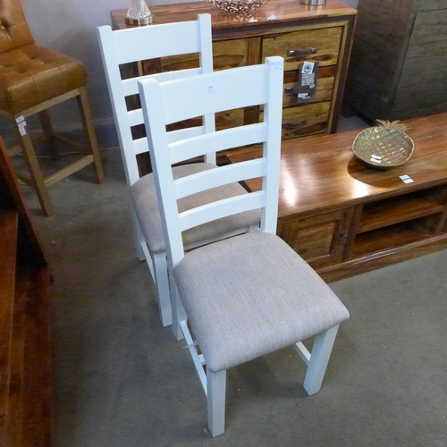 1502 - A pair of Chester white painted slat back dining chairs with fabric seats (NC-CHF-W) * this lot is s... 