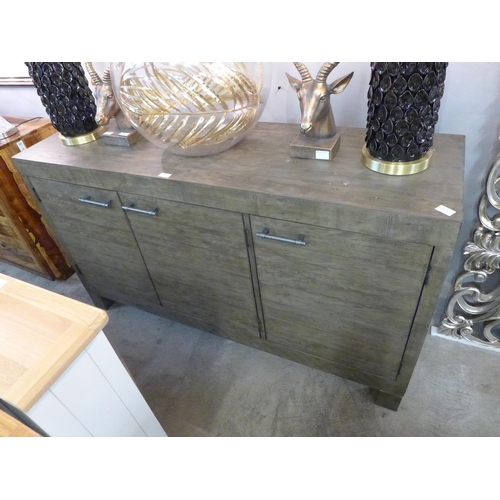 1510 - A rustic timber three door sideboard