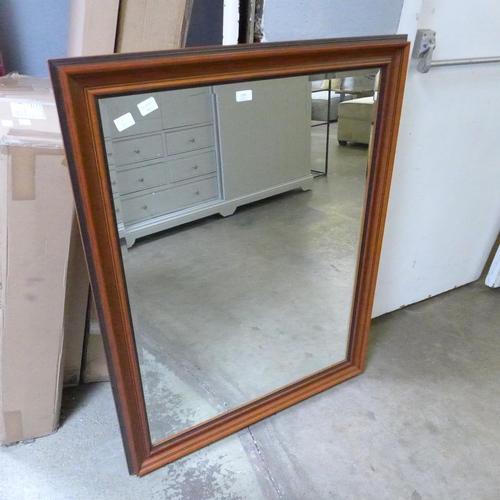 1908 - A bevelled framed mirror