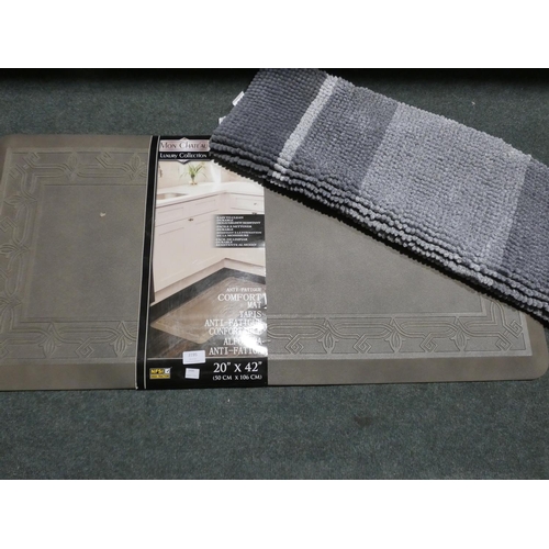 3195 - An anti-fatigue mat and a bath mat * This lot is subject to VAT