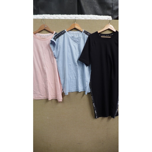 3387 - Three DKNY tops and one DKNY dress - mixed sizes and colours * This lot is subject to VAT