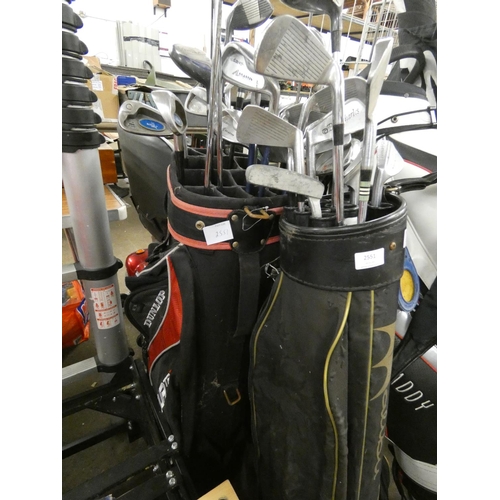 2551 - 2 Golf bags with various irons & woods (Howson, Slazenger, Dunlop, Air Bear)