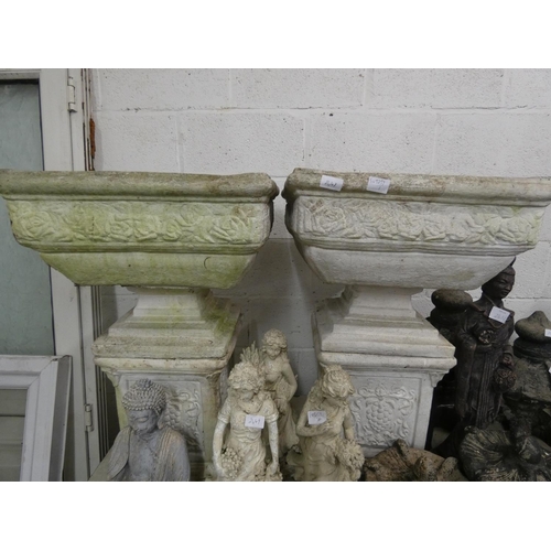 2648 - Pair of large 3 piece stone urns on plinths