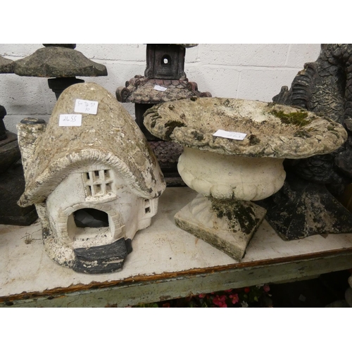 2655 - Stone urn and mushroom house