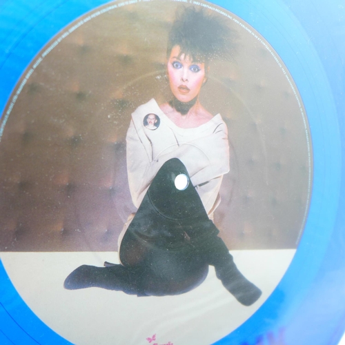 653 - Four picture disc records, Pat Benatar, Queen, Status Quo and Toto