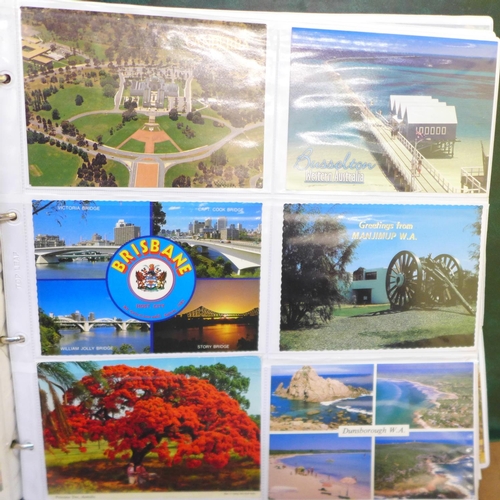 678 - Postcards; a large album of worldwide postcards, vintage to modern, Australia, New Zealand, South Af... 