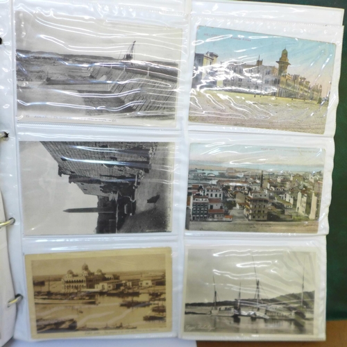 678 - Postcards; a large album of worldwide postcards, vintage to modern, Australia, New Zealand, South Af... 