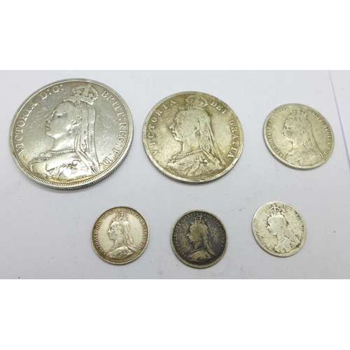 1002 - A Victorian 1890 crown and five other Victorian silver coins, 50.5g