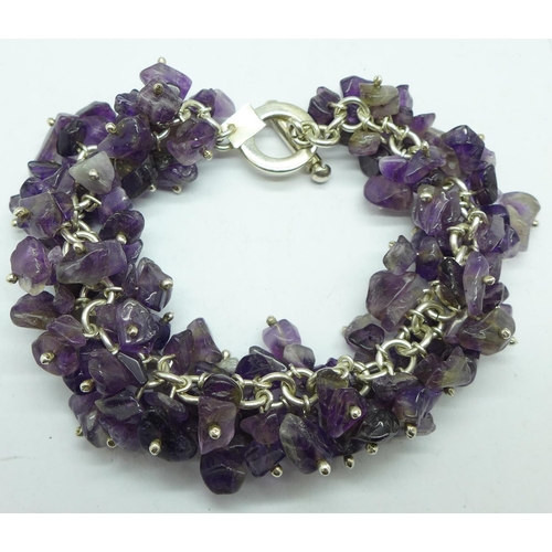 1003 - A silver mounted amethyst quartz bracelet, in a Kit Heath box