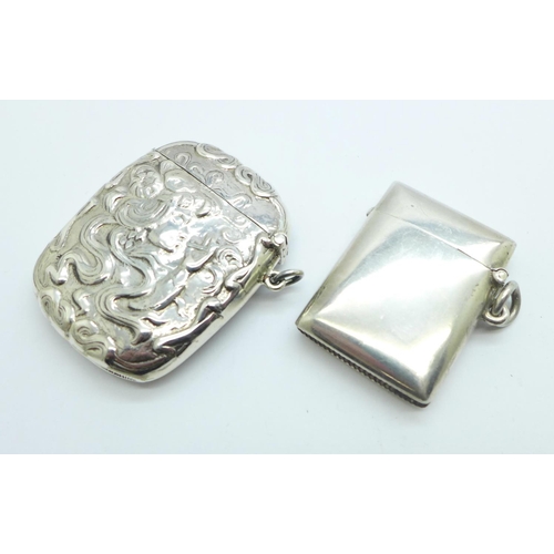 1121 - An Art Nouveau silver vesta case marked Sterling, 34g and one other silver vesta case, 22g