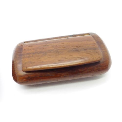 1125 - A Bakelite snuff box, one other snuff box and an egg shaped carved pomander